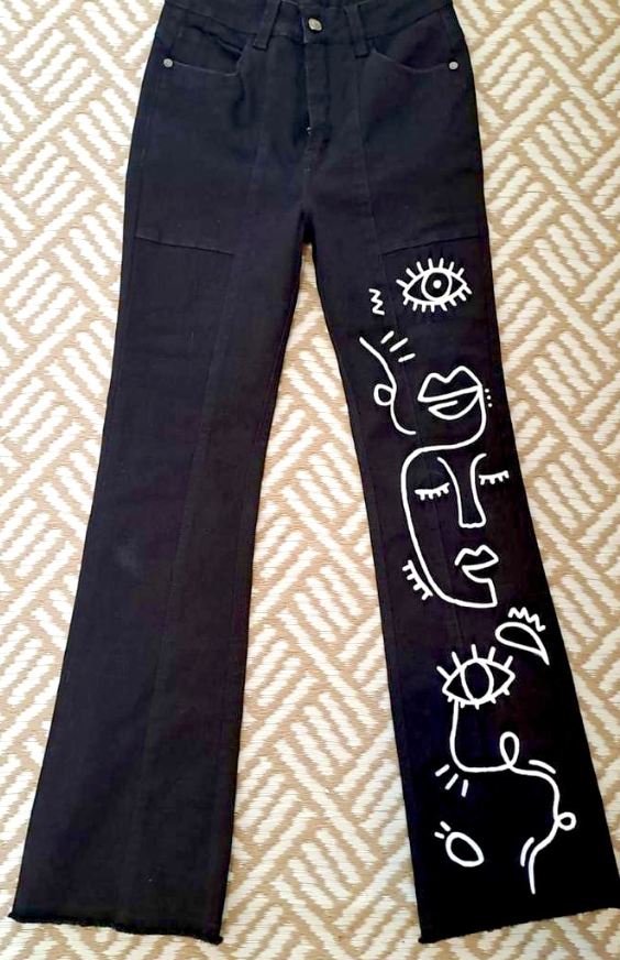 JEAN PINTADO CARAS NEGRO