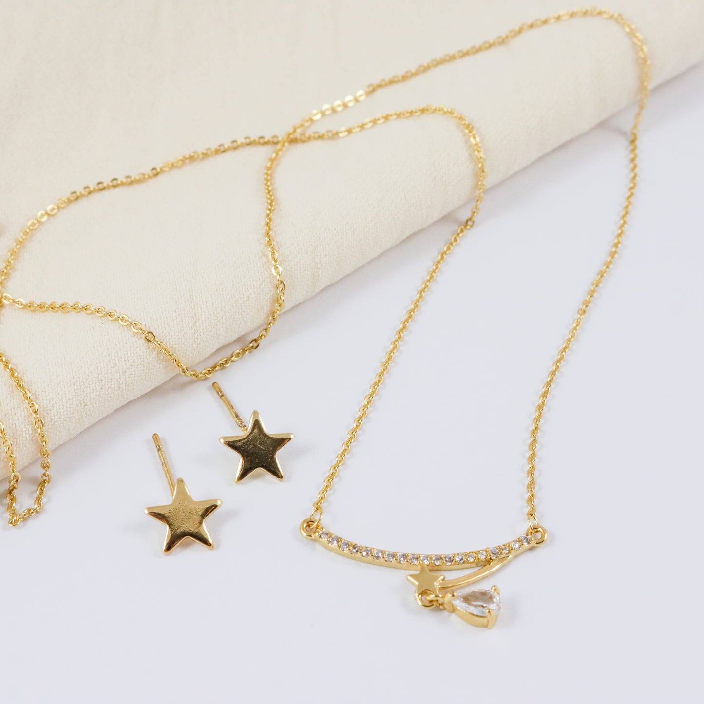 COLLAR DE ESTRELLA FUGAZ Y ARETES