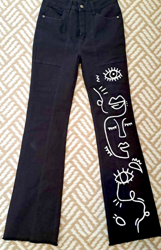 JEAN PINTADO CARAS NEGRO