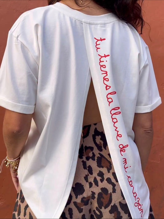 CAMISETA ABIERTA HAGAMOS LO QUE DICE EL CORAZÓN BLANCA